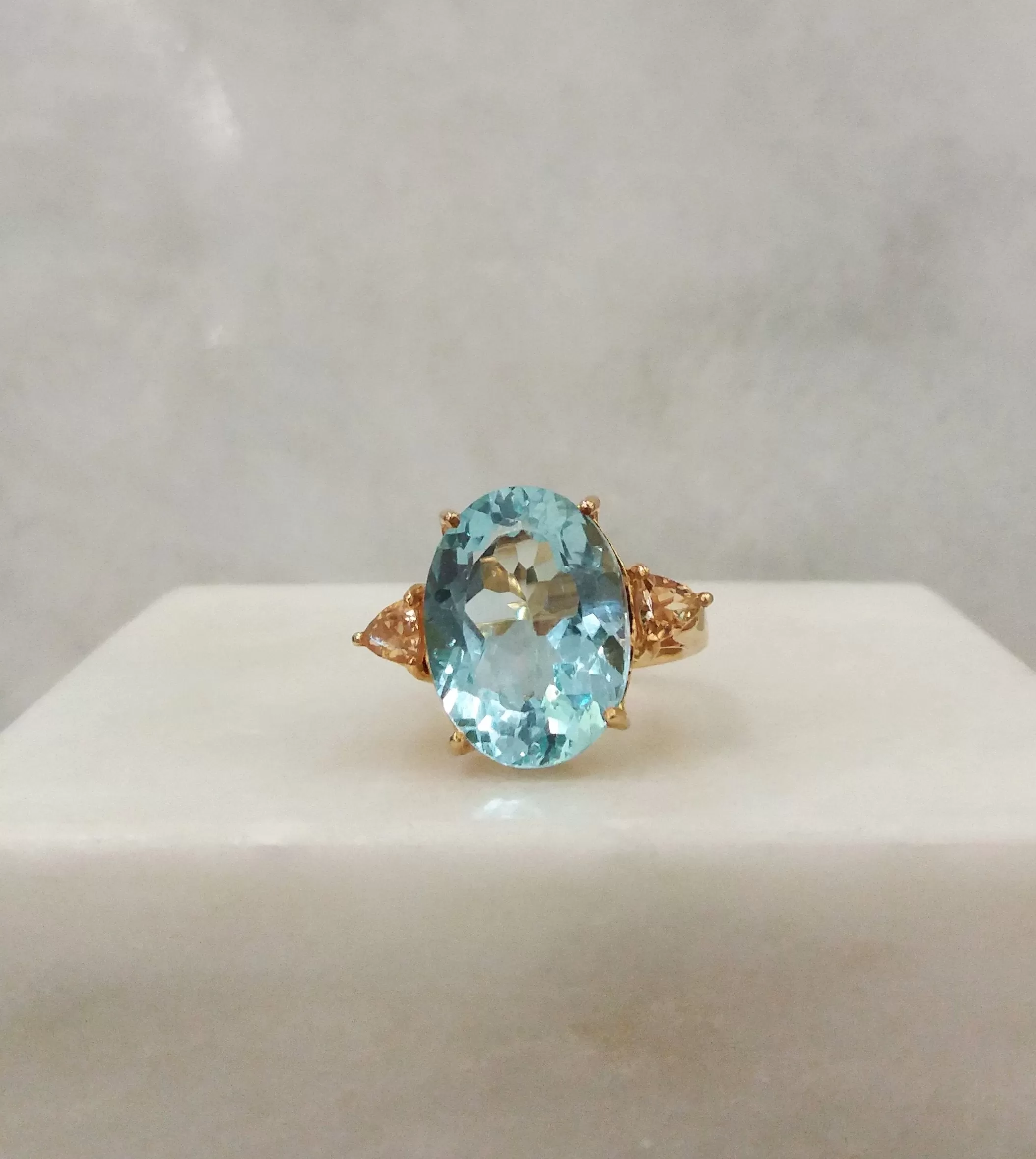 Oval Blue Topaz with Trillion Citrines Cocktail Ring